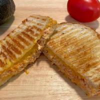 Buffalo Chicken Panini · Tender sliced chicken breast & sharp cheddar cheese melted together with tangy buffalo sauce...