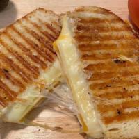 Four Cheese Panini · Swiss, Provolone, Cheddar, & Jack cheese melted together on sourdough and pressed on the gri...