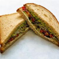 The Green Giant · Cream cheese, crisp slices of cucumber, tomato, sprouts and avocado on whole wheat