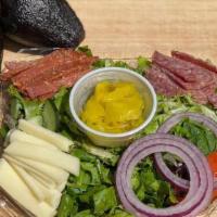 The Italian Salad · The Italian Torpedo without the bread. Pepperoni, salami, provolone, red onion, and pepperon...