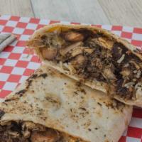 Jerk Chicken Burrito · Marinated jerk chicken,  red beans and rice, shredded cheese wrapped in warm flour tortilla.