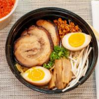Spicy Miso Ramen (Thick Noodle) · Miso base in pork bone broth, with chili oil, pork belly, spicy ground pork, egg, bamboo, be...