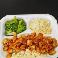 Bourbon Rice Bowl · Soul food mixed rice bowl topped with chicken or shrimp.