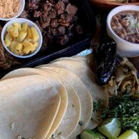 Taco Meal Deal (Serves 4) · Choice of 2 meats with Coconut rice or Navajo rice. Black Beans or Bolos Beans. 12 tortillas...
