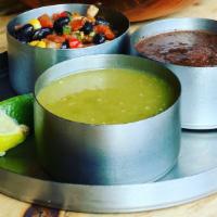 Salsa Sampler (3 Choices Of Salsa, Guacamole & Queso) · Signature sides, made fresh daily. Served with crisp corn tortilla chips.