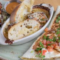 Trio Appetizer · 3 bacon-wrapped Caribbean BBQ Shrimp, Hot Maryland Crab Dip and a Chicken Quesadilla, served...