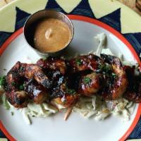 Caribbean Bbq Shrimp · Gluten free. Bacon-wrapped grilled shrimp basted in Caribbean bbq sauce, served with red chi...