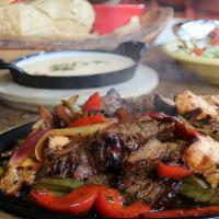 Bolos Fajitas · Your choice of steak, chicken, shrimp, veggie or combo fajitas. Served with navajo rice, bol...