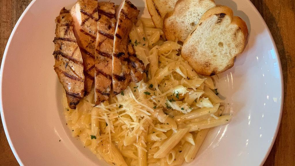 Mac-N-Cheese · Penne pasta tossed with Alfredo sauce and creamy parmesan cheese. Add your choice of meat.