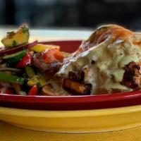 Evil Border Chicken · Grilled ale marinated chicken breast topped with chorizo, roasted poblano peppers and onions...