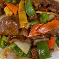 Pepper Steak · Sliced tenderloin beef combined with fresh green pepper and onion sautéed with special sauce.