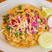 Fish Taco · Slice of tilapia filet on corn tortilla filled with melted cheese, citrus cabbage, creamy ch...