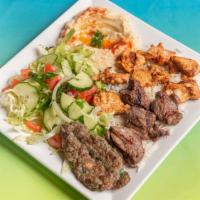 Mixed Lamb, Chicken Tawook & Kafta · Chicken, lamb, and ground beef marinated and grilled. Served with pita bread, hummus and salad