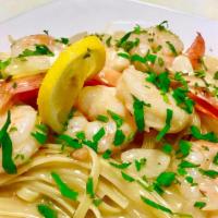 Shrimp Scampi · Sauteed with fresh garlic, lemon, white wine over linguini.