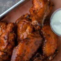 Smoked Chicken Wings - Single · 8 Wings - Smoked, then flash fried. Dry-rubbed or tossed in your choice of sauce. Served wit...