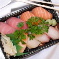 Sushi Regular · Eight pieces chef's choice of (sushi or sashimi). Choice of California roll or spicy tuna ro...