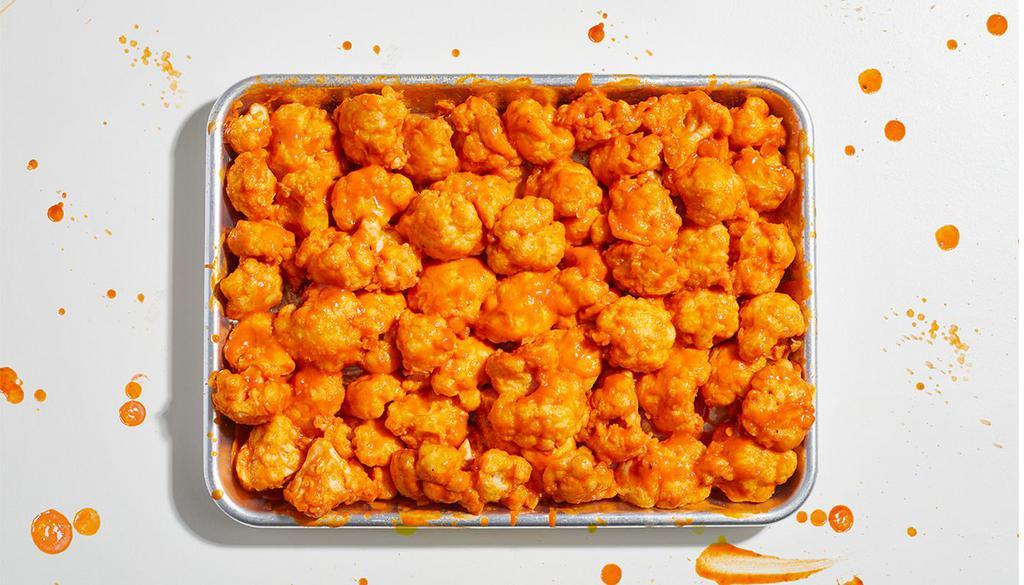 20 Piece Cauliflower Bites · 20 crispy bites of cauliflower fried to perfection and tossed in your choice of sauce. Served with celery and ranch or blue cheese.