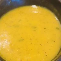 Mulligatawny Soup · Yellow lentils, black peppercorn, garlic and ginger.