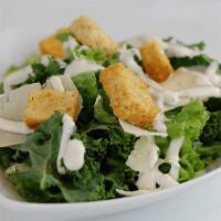 Side Caesar Salad · Kale/Romaine blend topped with shaved parmesan, homestyle croutons, and creamy Caesar dressi...
