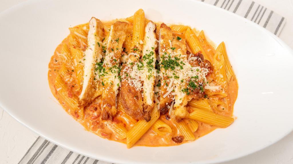 Penne A La Vodka · Penne pasta sautéed with vodka cream tomato sauce.
Add shrimp and chicken for an additional fee.