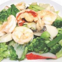 Seafood Combo · Lobster, jumbo shrimp, imitation crab meat & scallops all skillfully sautéed w. fresh vegeta...