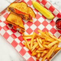 Midwest Melt · Swiss and American cheese, two smash patties with midwest sauce, sandwiched between two gril...