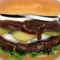 Double Meat Backyard Burger · Half pounder freshly pressed beef patty, lettuce, pickles, onions, bbq sauce

Notice: Peanut...