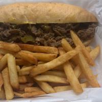 Philly Cheesesteak · Thinly sliced ribeye, smothered with onions, peppers, marinara sauce, and cheddar cheese, se...
