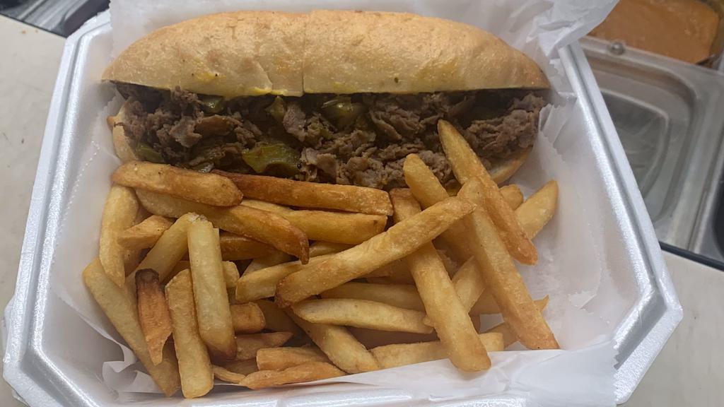 Philly Cheesesteak · Thinly sliced ribeye, smothered with onions, peppers, marinara sauce, and cheddar cheese, served with fries.