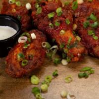 Wings · crispy fried wings served with a dipping sauce
