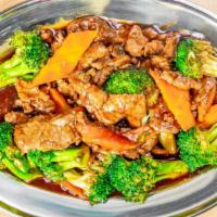 Broccoli · With carrots in a brown sauce. Served with steamed rice and fortune cookie.
