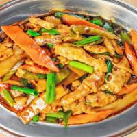 Szechwan · Spicy. Celery, carrots and bamboo shoots in a hot brown sauce. Served with steamed rice and ...