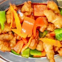 Ds14. Sweet And Sour · Bell peppers, carrots, white onions and pineapple with a red sweet and sour sauce. Served wi...