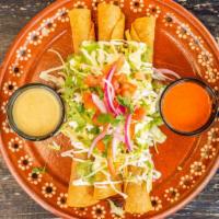 Flautas Deshebrada O Pollo · Recommended. Order of three.  Shredded Beef or Chicken. Topped with avocado and sour cream s...
