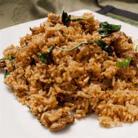 Spicy Basil Fried Rice · Choice of meat stir-fried with rice, garlic,
chili, fresh basil leaves, red bell peppers
, a...