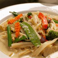 Green Curry · Your choice of meat simmered in a traditional
green curry sauce with bamboo shoots, fresh
eg...