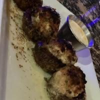 Crab Stuffed Mushrooms · Crab meat and smoked gouda stuffed inside mushrooms and baked in garlic butter