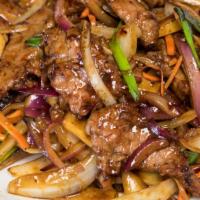 Mongolian Beef · Spicy. Beef, onions, bamboo shoots and carrots stir-fried in a spicy sweet brown sauce.