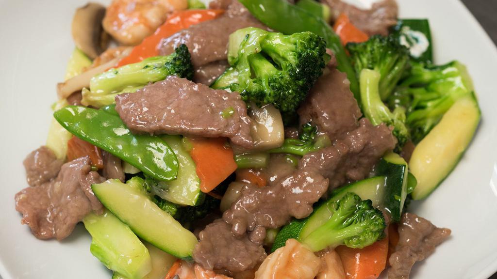 Sea & Shore · Beef, shrimp, zucchini, carrots, mushrooms, broccoli and snow peas in chef's special sauce.