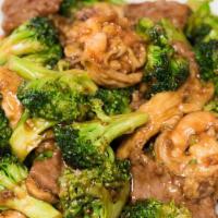 Triple Delight · Shrimp, chicken and beef with broccoli.