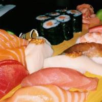 Sushi Sashimi Combo (Chef Choice) · Six sushi, six sashimi and salmon roll.