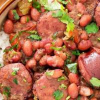 Red Beans Rice With Sausage · Savory sausage simmered in red beans with steamed white rice.