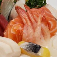 Sashimi Appetizer (9 Pcs) · chef choice the fresh fish of the day.