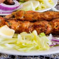 Chicken Kebab 2Pcs · Chicken marinated and perfected over an open flame tandoor (clay oven).