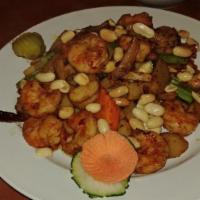 Kung Pao Shrimp · Spicy. Shrimp sautéed in a rich brown sauce, with dried hot peppers, peanuts, diced bamboo s...