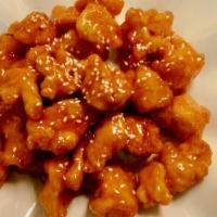 Orange Chicken · Spicy. Chunks of crispy chicken with green onions, dry orange peels, and chili peppers, saut...