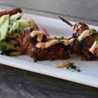 Filet Mignon Satay · Chunks of Filet Mignon marinated and skewered, Grilled to your selection, Herb Aioli, Sweet ...