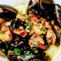 Mussels Appetizer · Sautéed PEI Mussles, Applewood Bacon, White Beans, White Wine & Butter