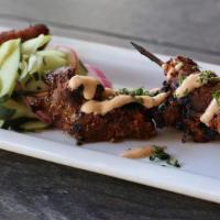 Twin Filet Mignon Satay · Two Skewers (4-5 oz each) of Filet Mignon Chunks, Grilled to your liking, Herb Aioli, Cucumb...