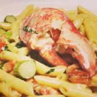 Lobster Pasta · Steamed Fresh Lobster Meat,Asparagus, Roma Tomato, Cognac Cream Sauce, Penne Pasta